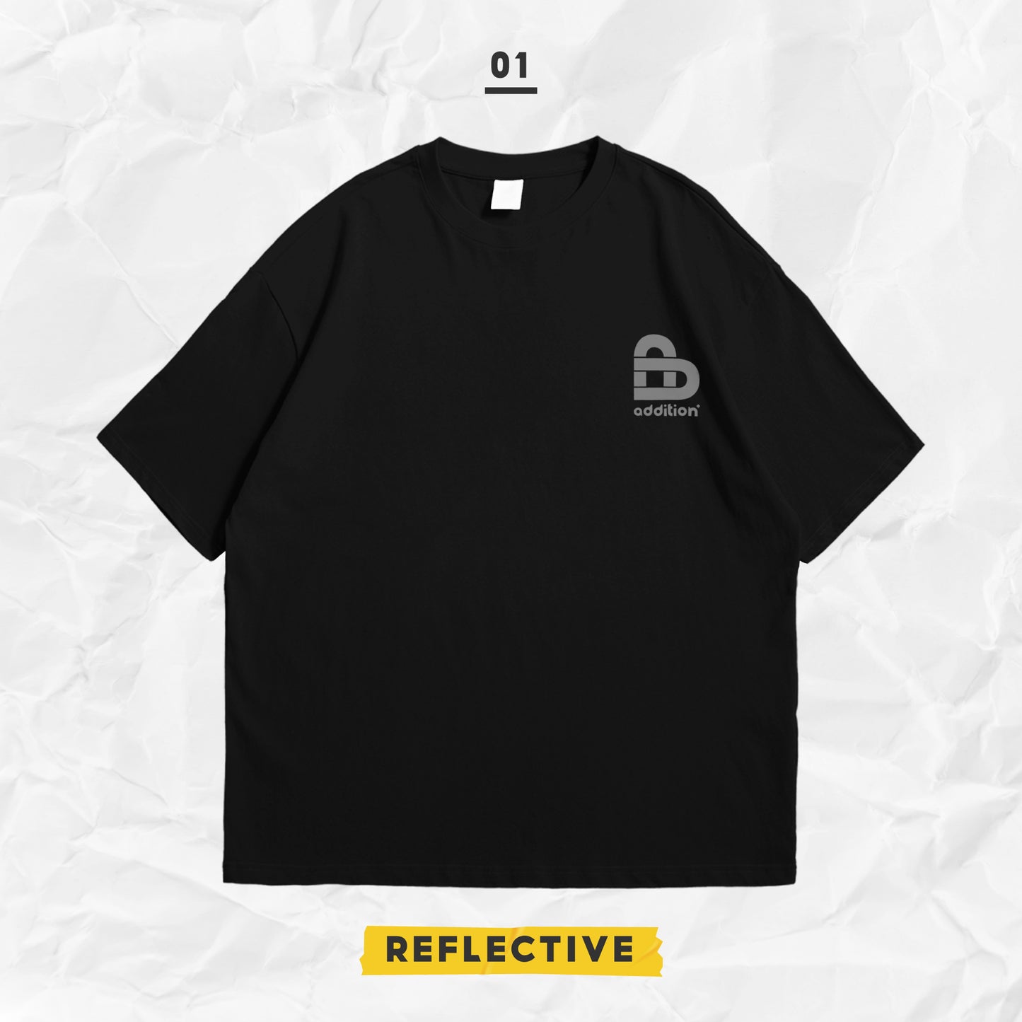 ADTN BLACK REFLECTIVE LOGO TEE